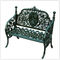Tableau et chaises de cuivre de fonte de jardin de rouille dans le banc antique de fonte de cru de style